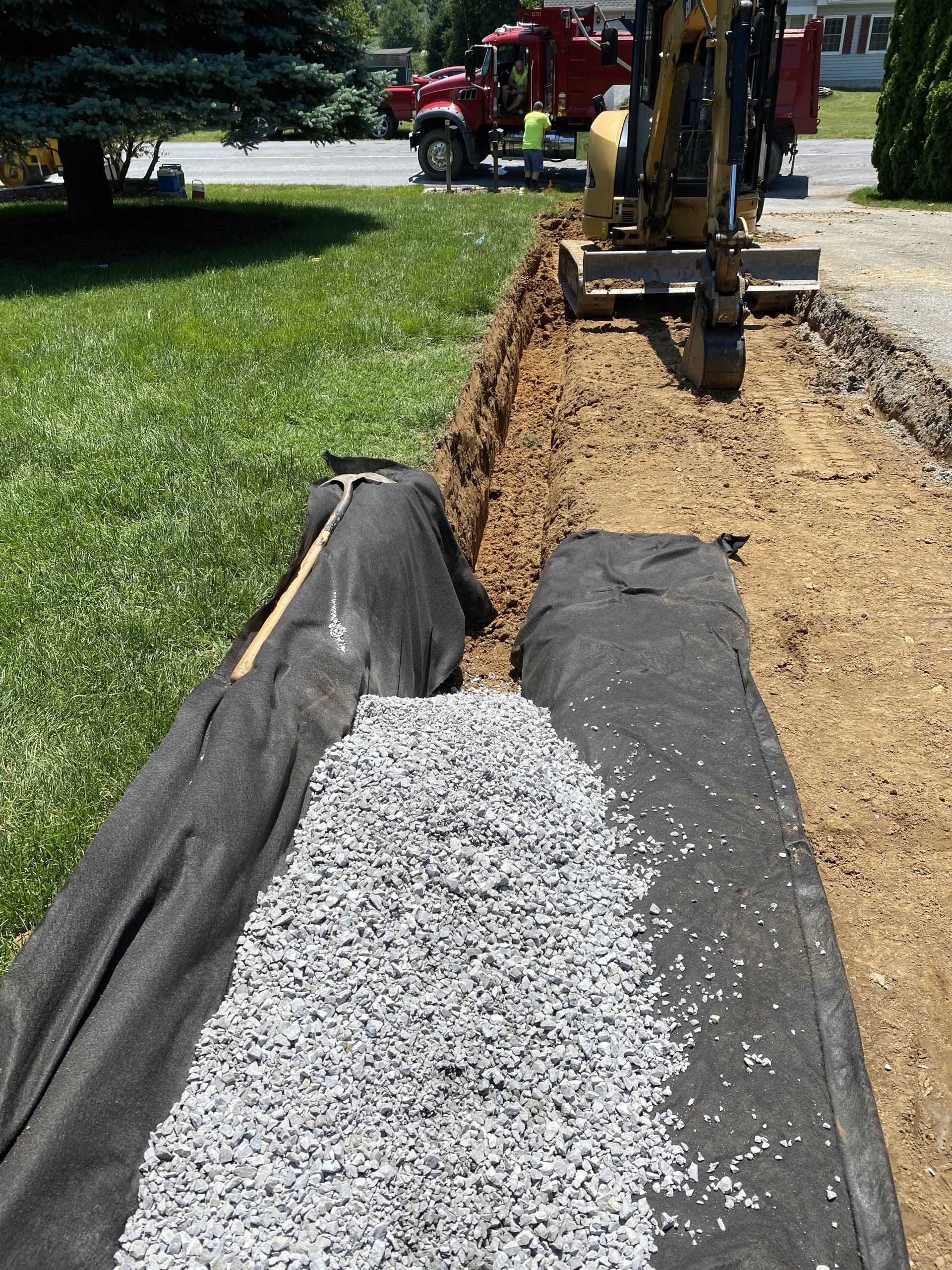 A bulldozer is digging a hole in the ground.