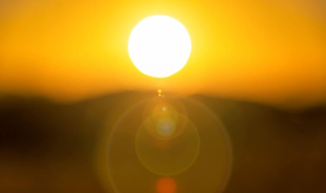 burning sun over the horizon