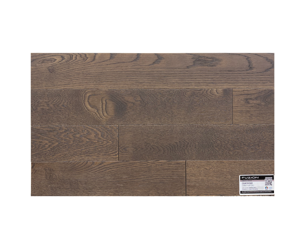 A close up of a piece of hardwood flooring on a white background.