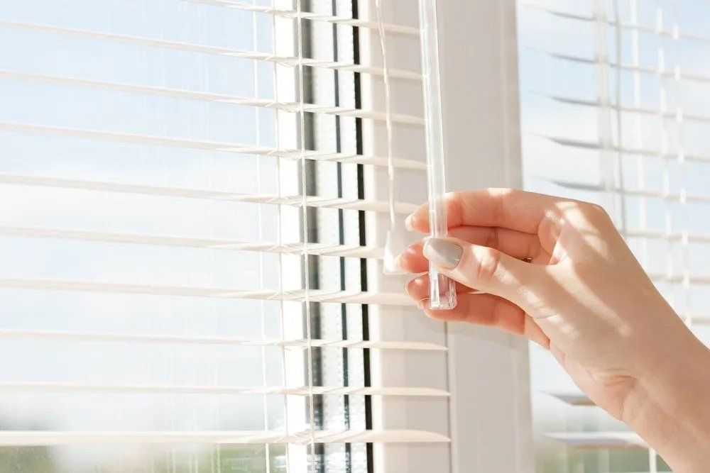 Closing Blinds to Lower the Temperature of Your Home