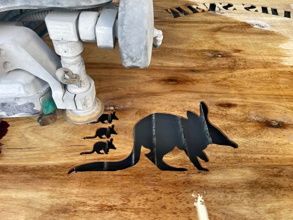 A Stencil of a Kangaroo on a Wooden Surface — NQBC Pty Ltd in Moranbah, QLD