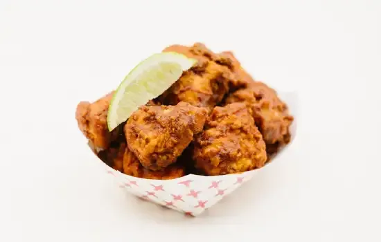 Super chix ghost pepper nuggets with fries.