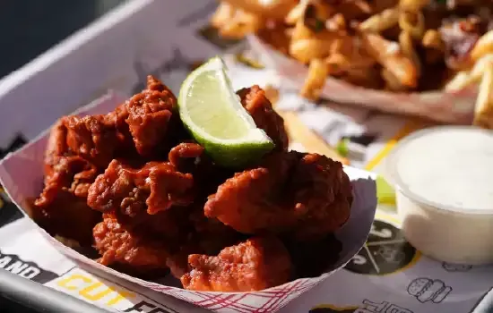Super chix ghost pepper nuggets with loaded fries and ranch dipping sauce.