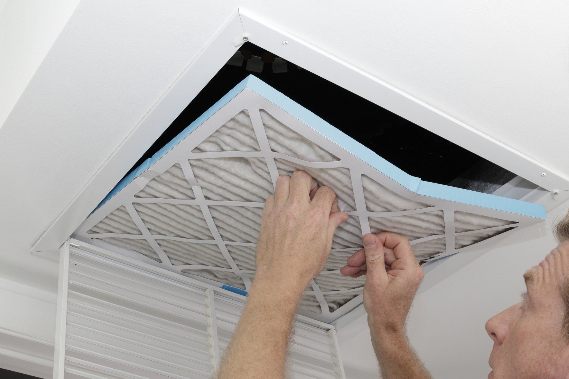 Air Conditioning Repair — Changing Filter in Pinckney, MI