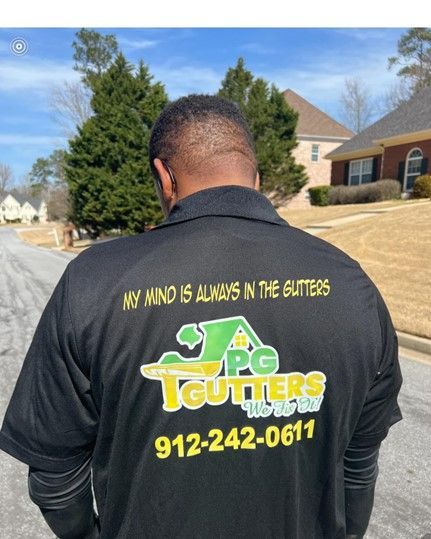 A man wearing a shirt that says my mind is always in the gutters