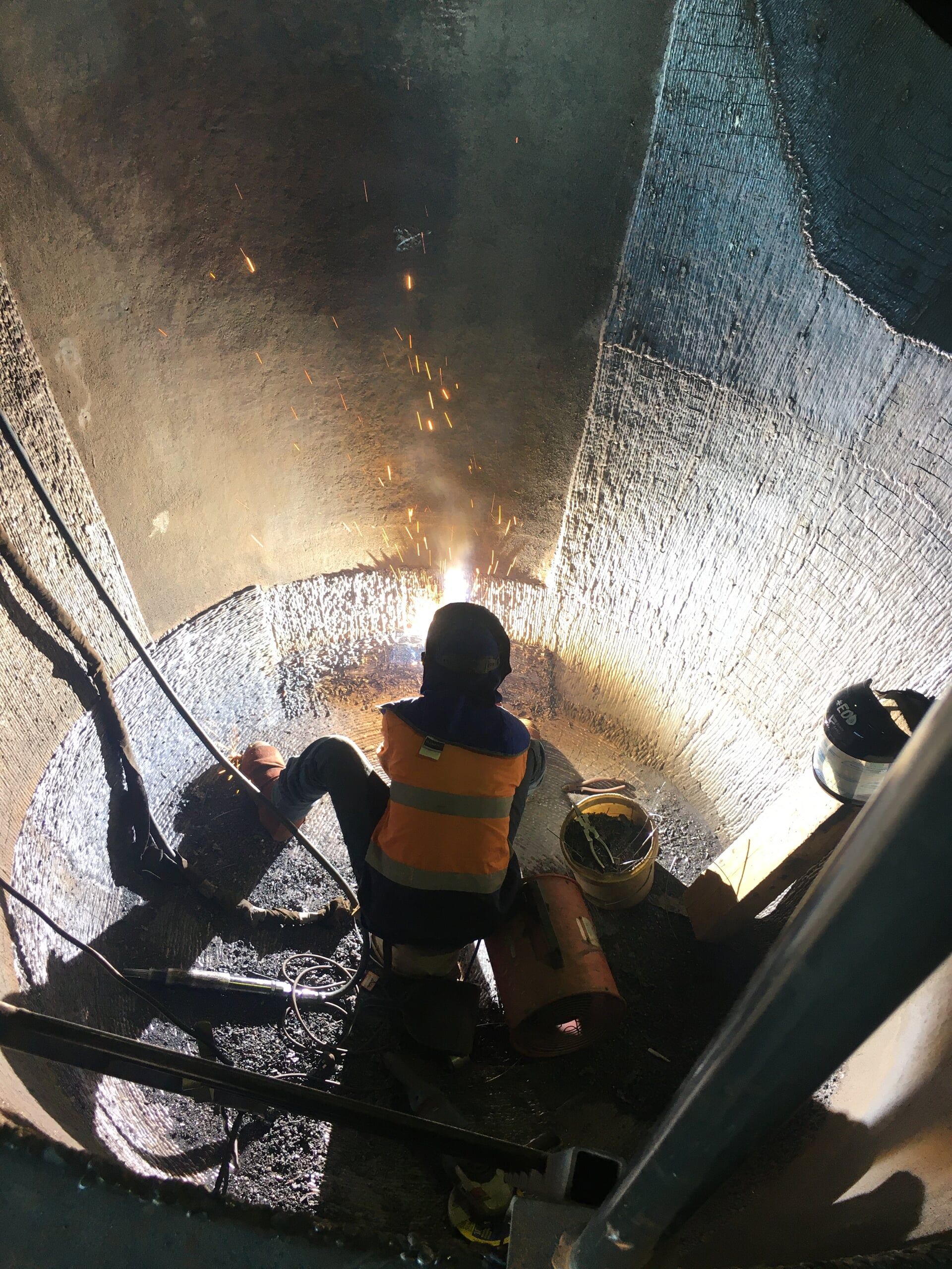 A worker fabricating steel in the workshop in Mount Isa