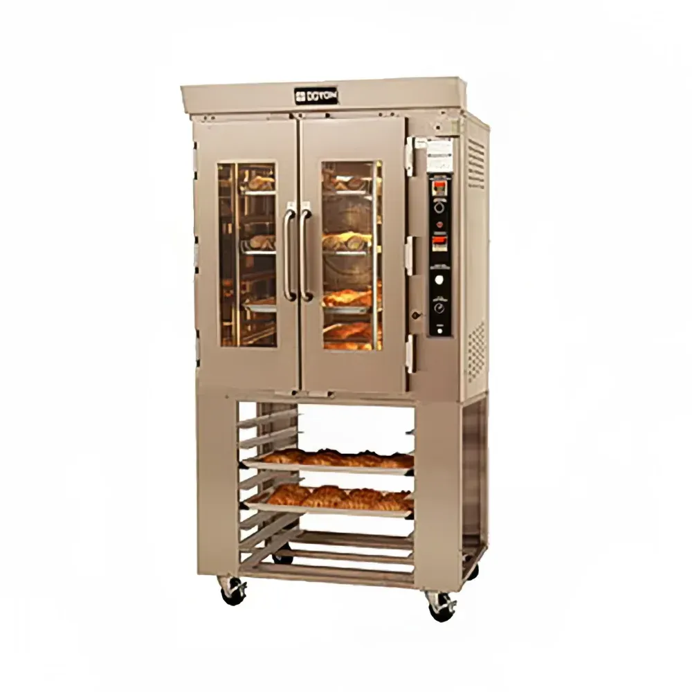 A stainless steel oven with wheels and shelves filled with bread on a white background.