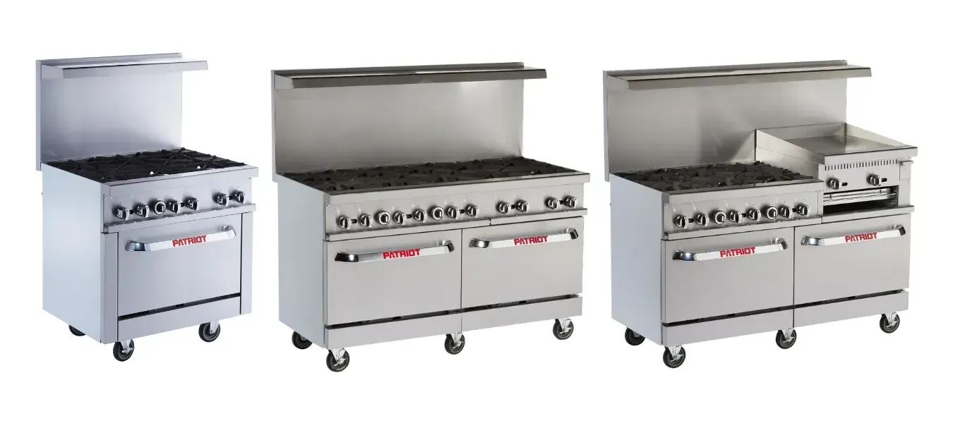 A row of stainless steel stove top ovens on wheels