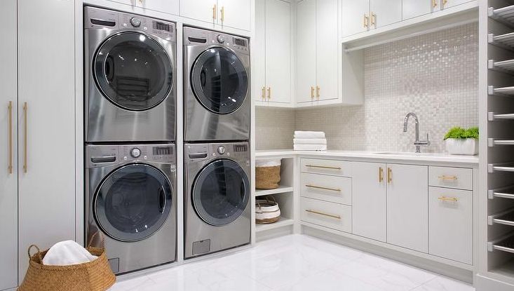 Two stacked washer and dryers in one Peachtree City Georgia home

