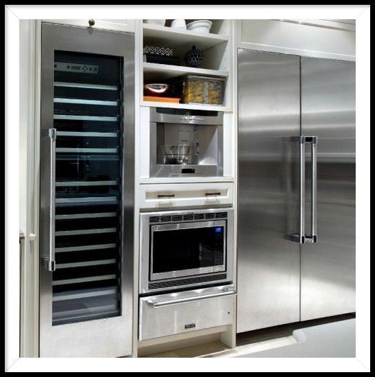Luxury Refrigerator, Coffee Maker, Microwave, and Wine Storage Unit
