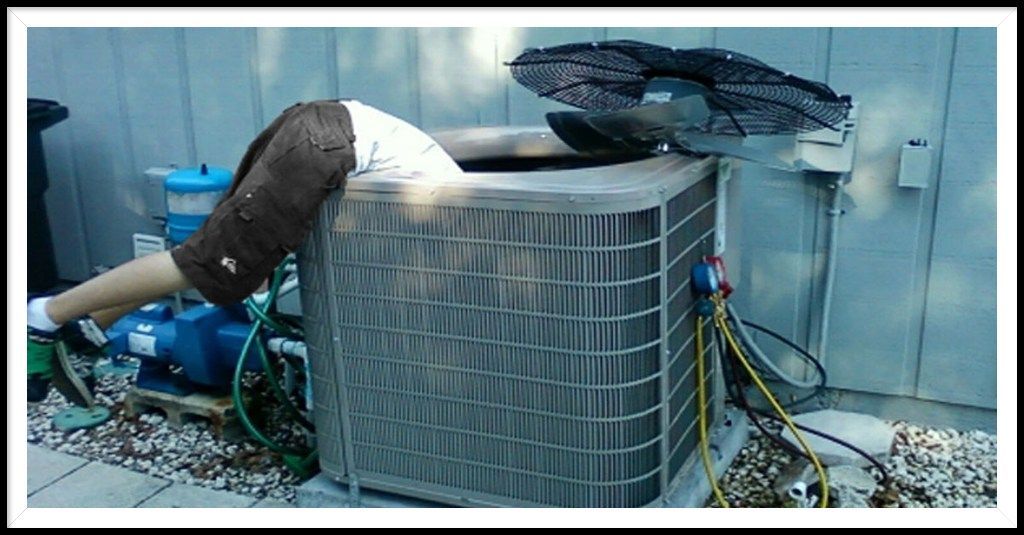 A Goodman Air Conditioning Unit is Being Repaired
