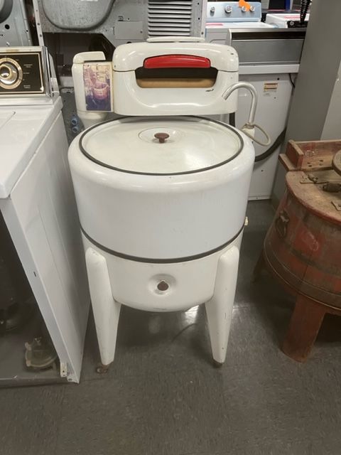 An old washing Machine rebuilt by John's Heating, Cooling, and Appliance Repair

