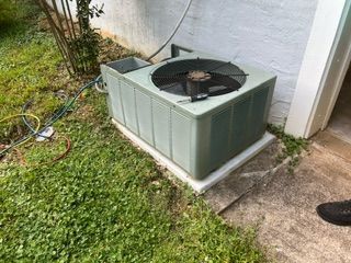 Aruud air conditioner is being repaired in Newnan by John's Heating, Cooling, and Appliance Repair
