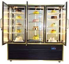A display case filled with lots of cakes and cupcakes.