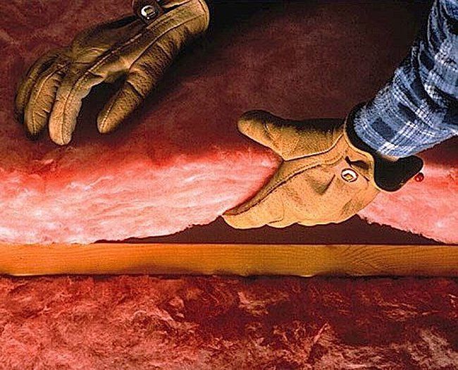 Foam — Worker Holding a Fiber Insulation in Hot Springs, AR