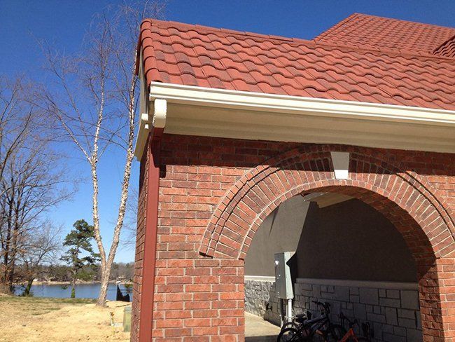 House with Brown Roof and White Gutter — Hot Springs, AR — Southern Insulation & Gutters Inc