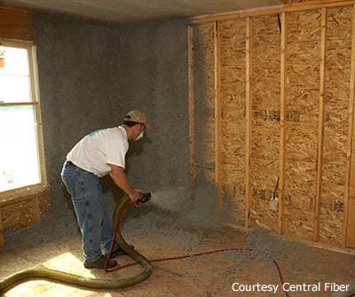 Cellulose Insulation — Staff Installing Cellulose Insulation in Hot Springs, AR