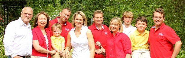 Insulating — Thomas Family Posing for a Photo in Hot Springs, AR