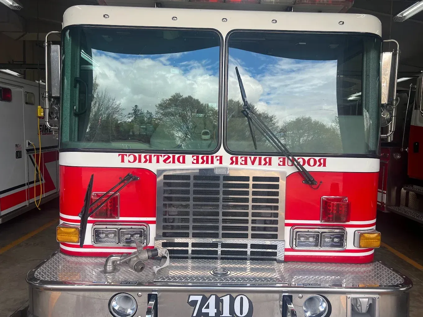 Fire truck, Rogue River Fire District, parked indoors, red and white, front view, 7410.