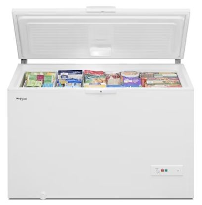 A white chest freezer with the lid open, filled with various frozen food packages.