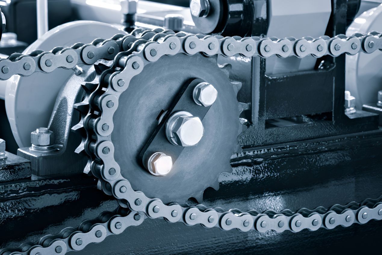 A Close Up Of A Chain And Gear On A Machine — Belt Maintenance & Supplies Pty Ltd In Nindaroo, QLD