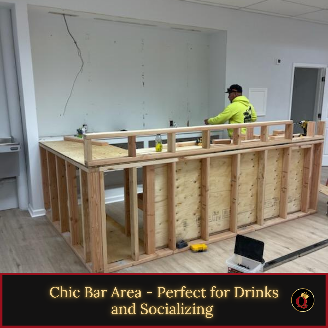 A man is working on a chic bar area perfect for drinks and socializing
