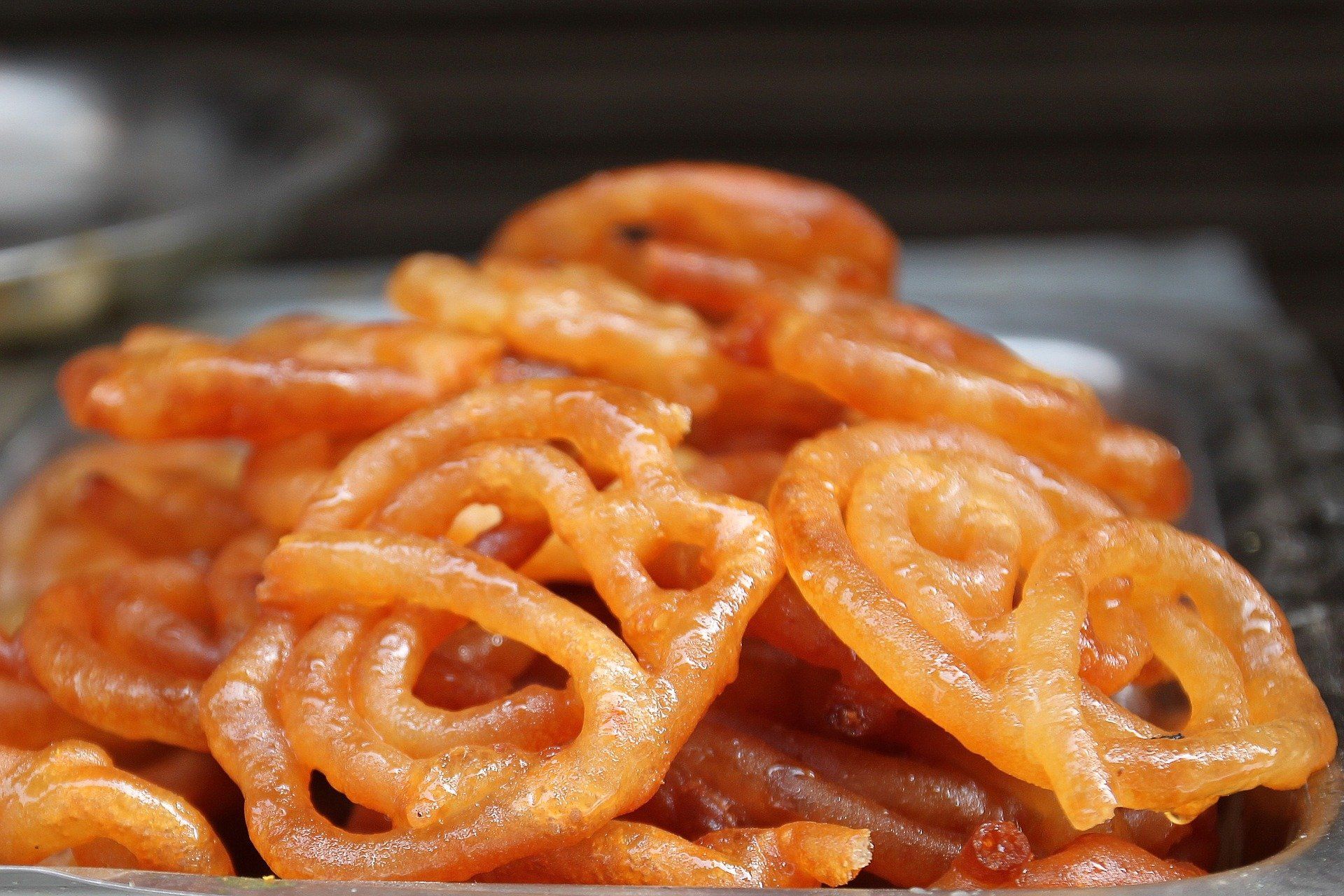 A close up of a pile of fried food on a table.
