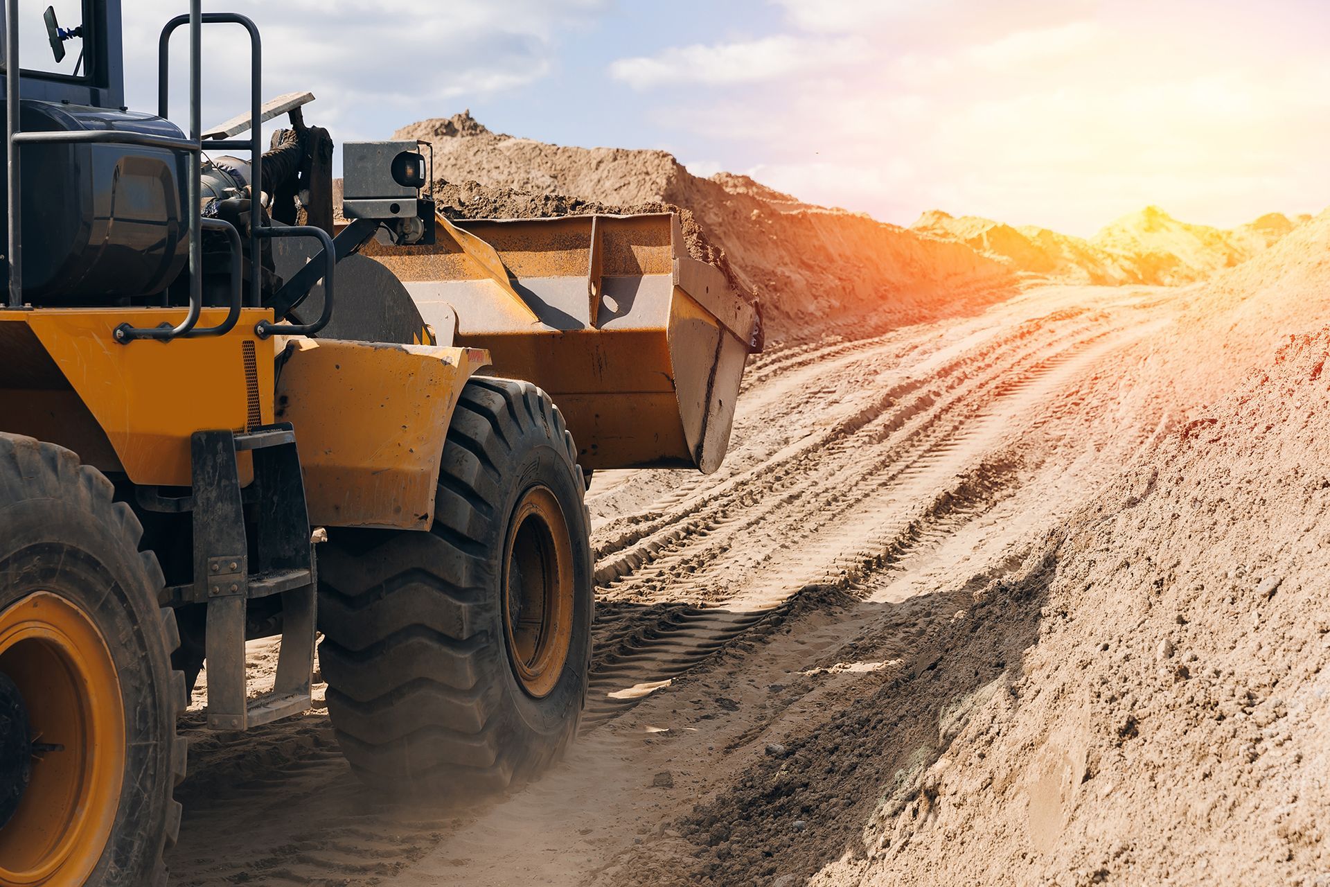 Excavator Transporting Sand