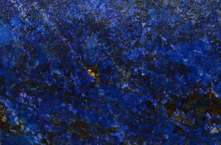 A close up of a piece of blue marble.