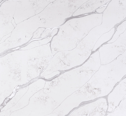 A close up of a white marble counter top.