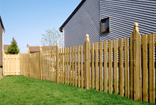 a wooden palisade fence