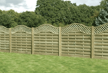 A wavy woven wooden fence