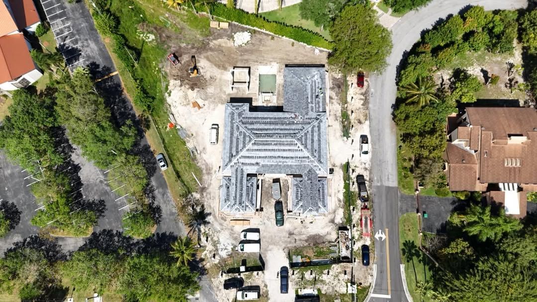 Aerial view of new single family home under construction by a South Florida construction company