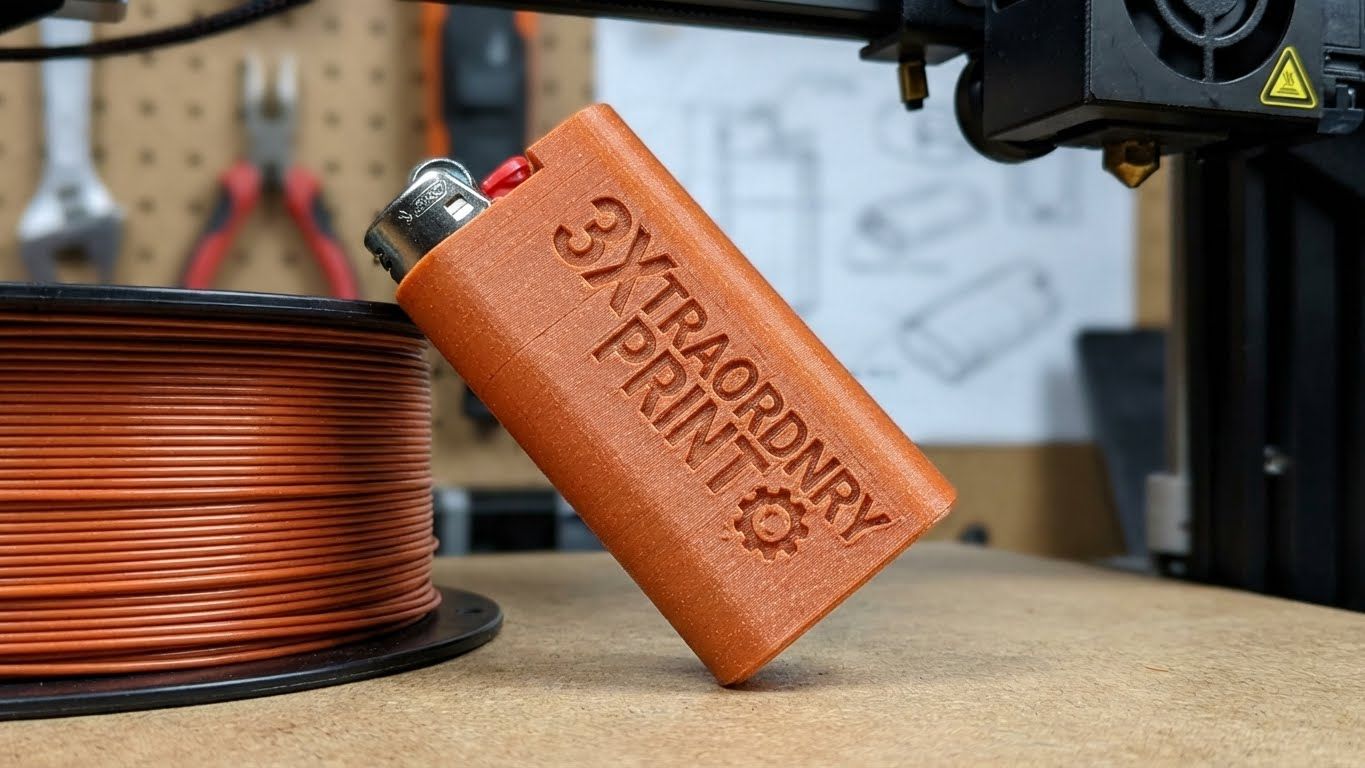 Orange 3D-printed lighter case with 