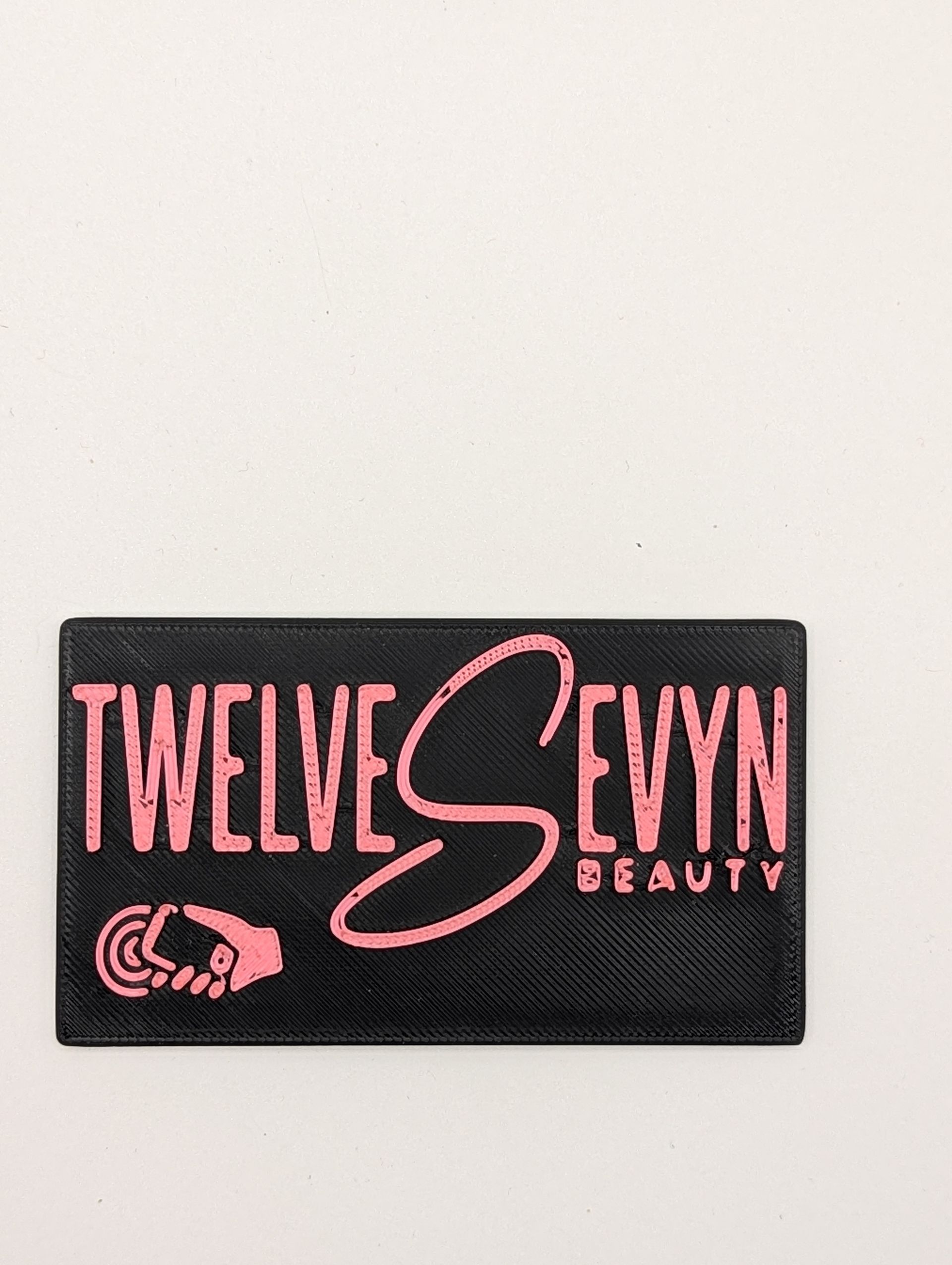 Hand holding phone over a 