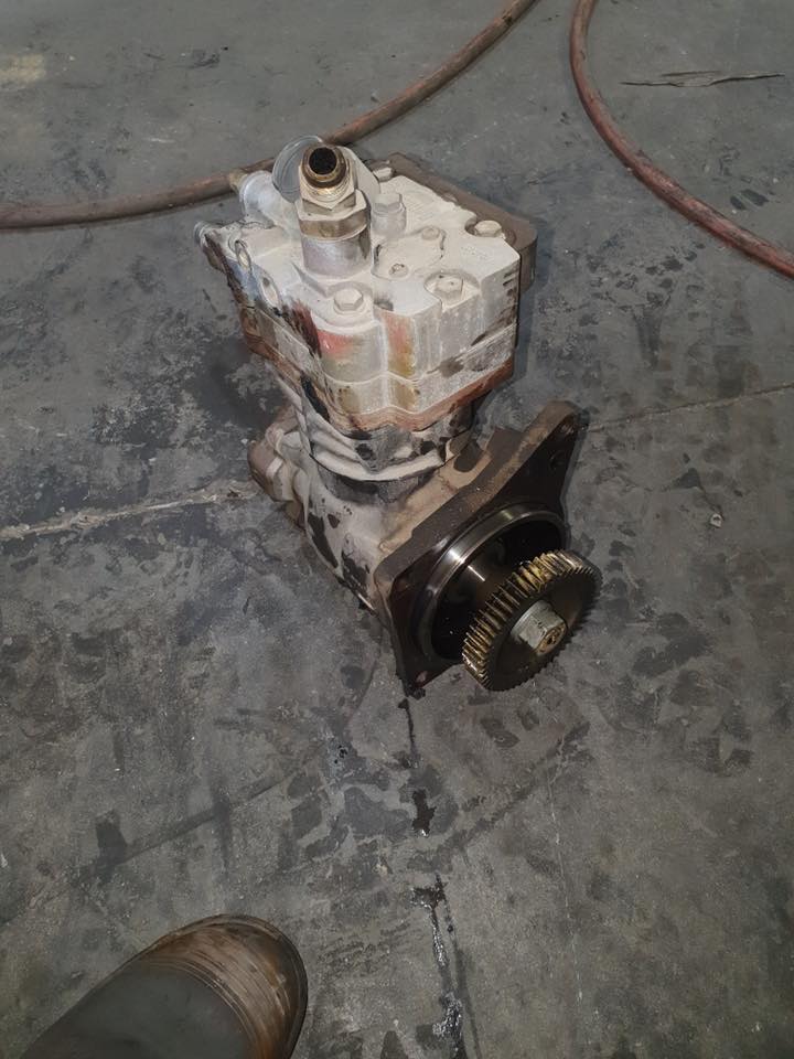Truck Compressor Sitting On Garage Floor — Mid North Coast Heavy Vehicle Repairs In Wauchope, NSW