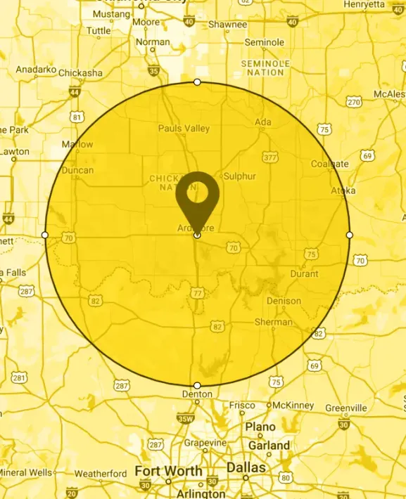 A yellow map with a circle around it and a pin on it.