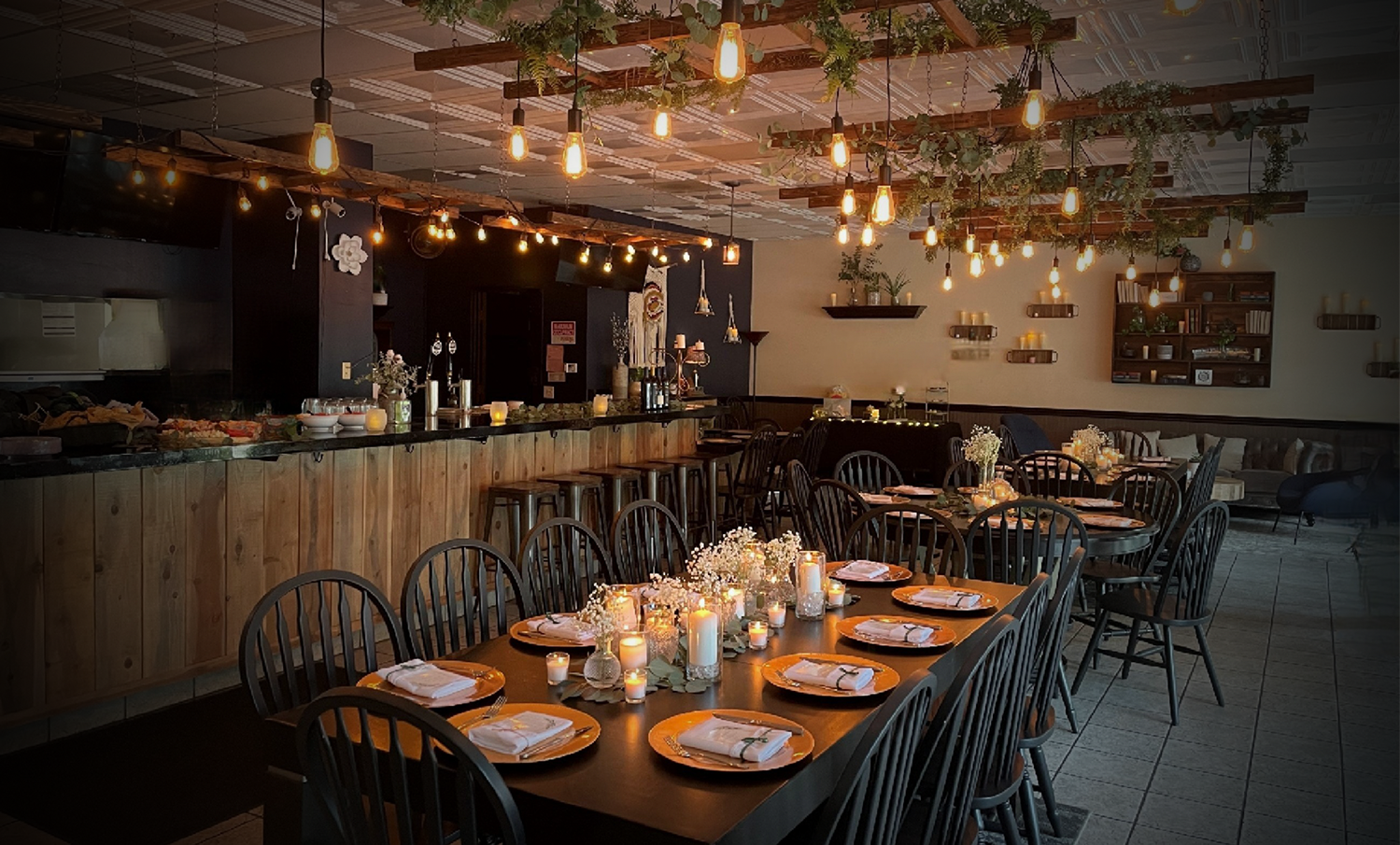 Wine Country Catering sets the ambience for a rehearsal dinner with hanging bistro lights and elegant table settings at The Nook in Temecula, CA