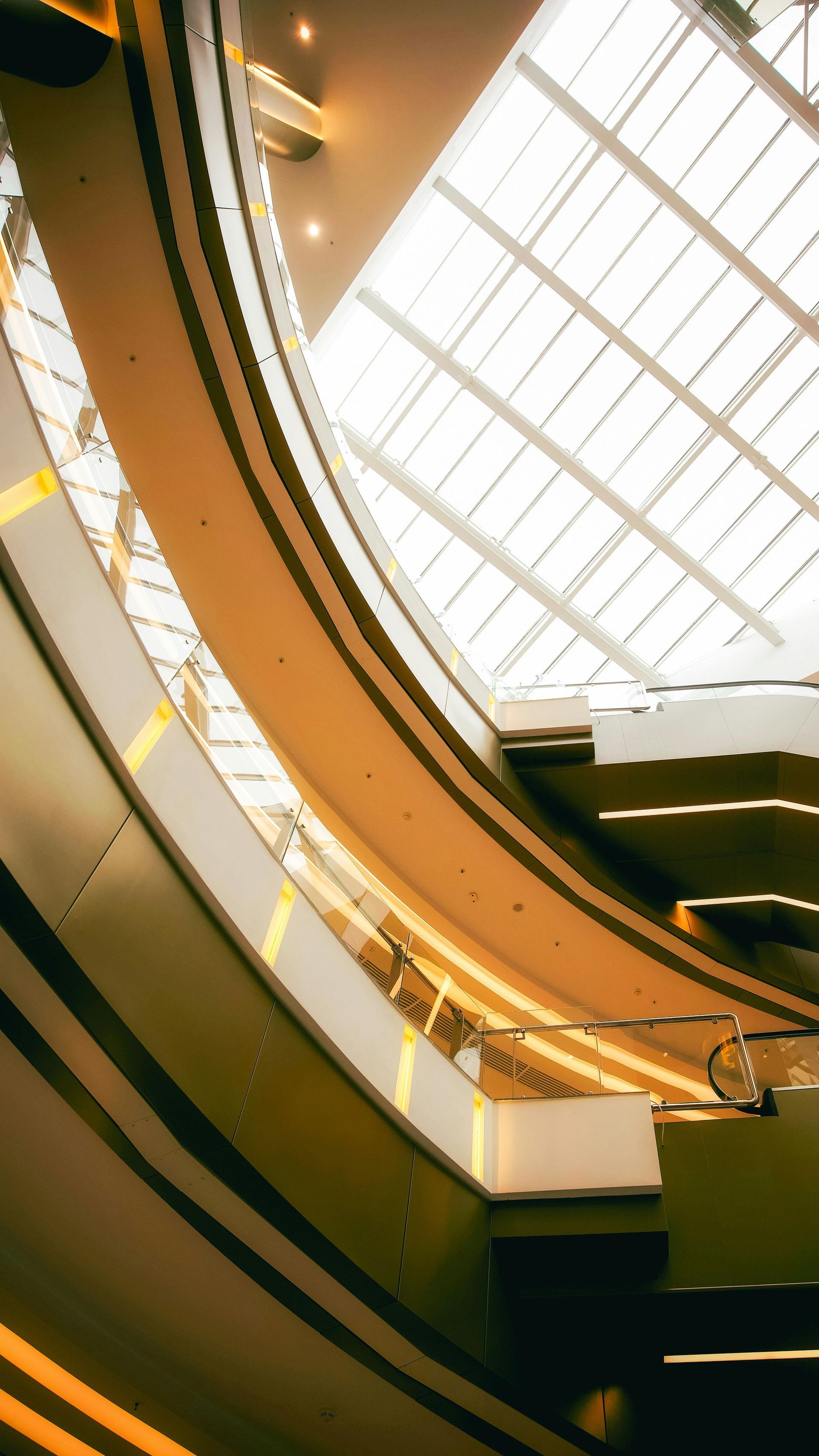 Looking up at the ceiling of a building with a glass roof