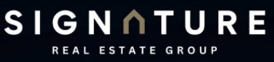 A logo for the signature real estate group
