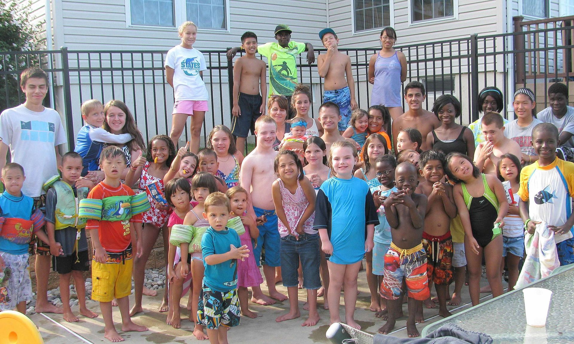 A large group of children are posing for a picture