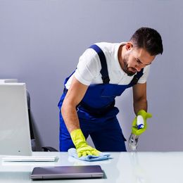Janitor Cleaning Computer Desk — Beaver Falls, PA — Cline Cleaning & Restoration