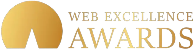 A logo for web excellence awards with a gold circle in the middle