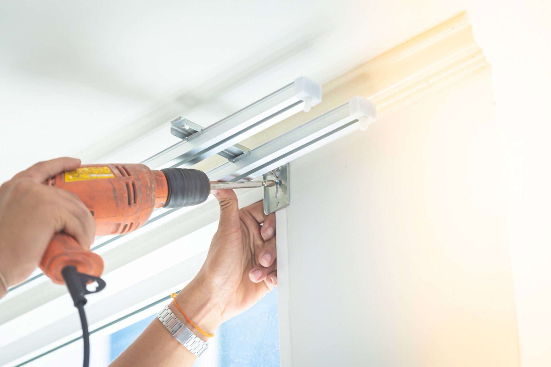 Installing the curtains by professional — Beaverton, OR — Go Pro Blind Cleaning & Repair LLC