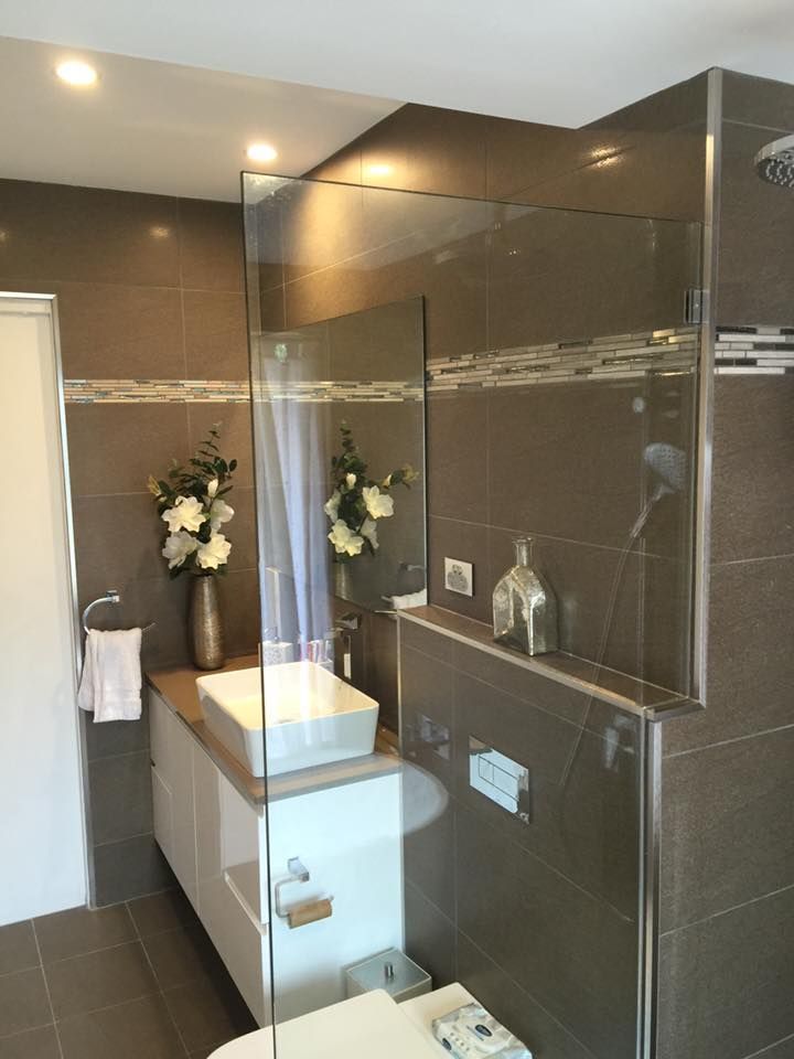 Bathroom with Glass Shower, Sink, and Toilet, Featuring Gray and White Tiles — Master Glass & Glazing in Newcastle, NSW
