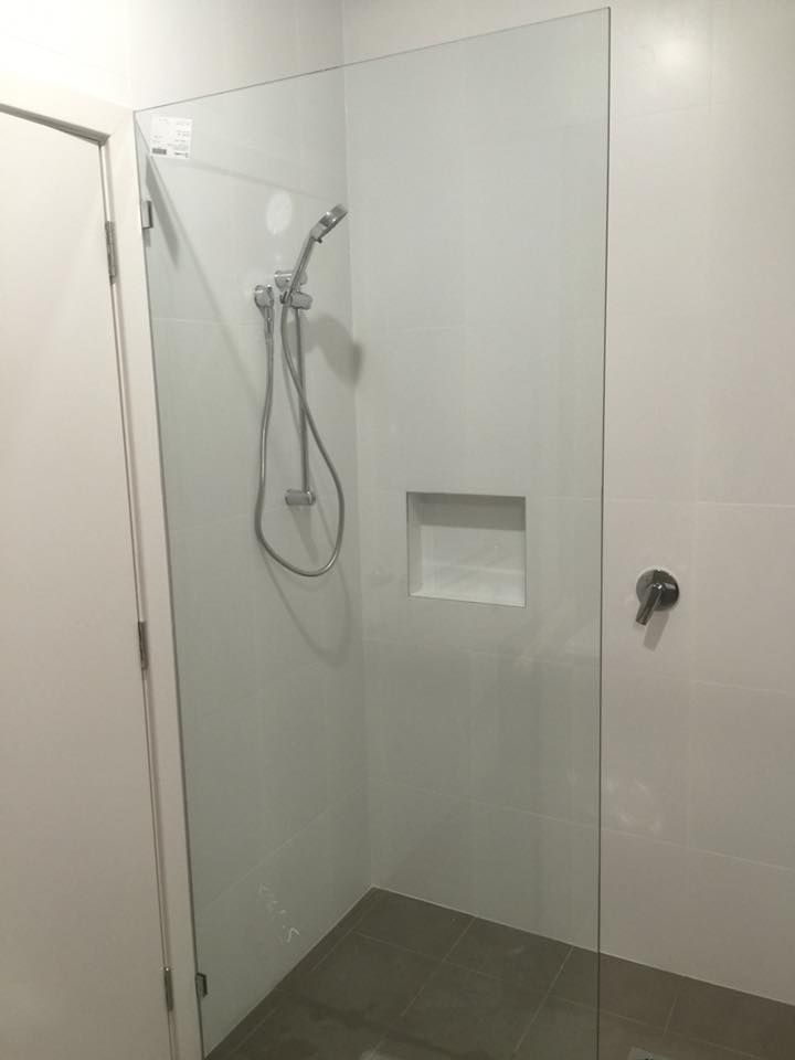 Shower Enclosure with Glass Panel Door and Built-In Shelf — Master Glass & Glazing in Wallsend, NSW
