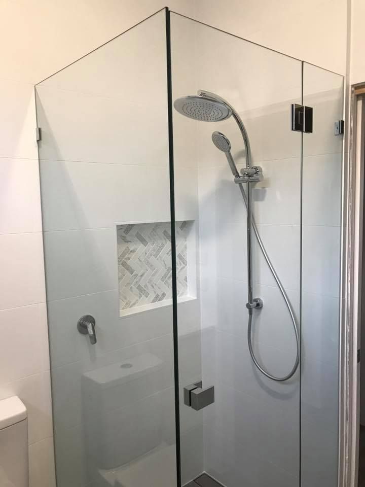 Glass Shower Enclosure with Rain Shower Head — Master Glass & Glazing in Warners Bay, NSW