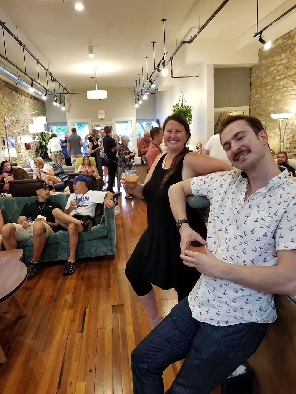 Large gathering of people at Eagles' Rest Natural Mattresses and Furniture inLawrence, Kansas.