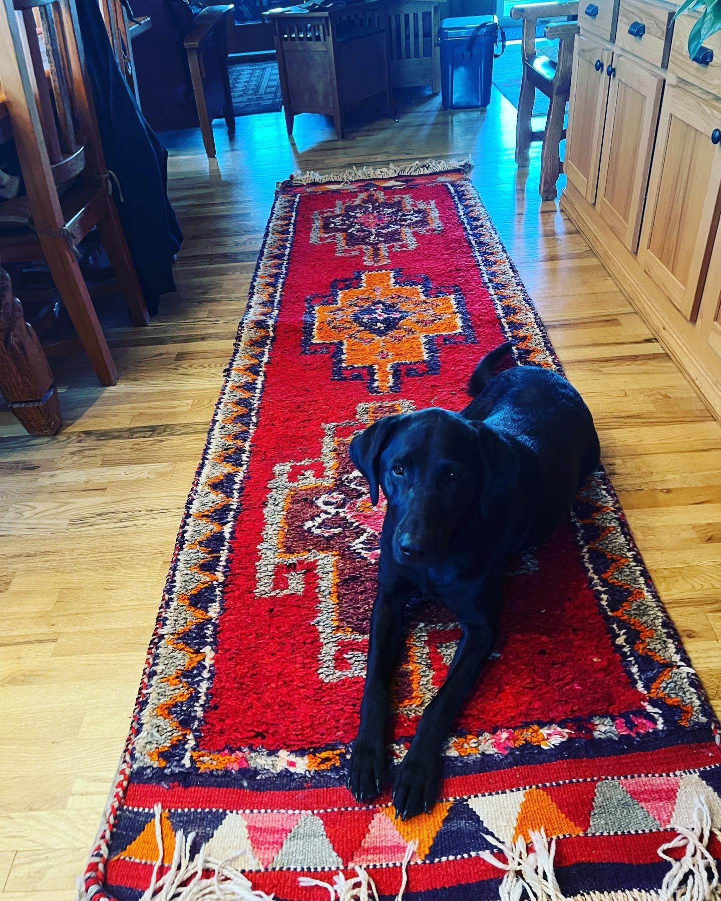 Colorful red floor runner from Eagles' Rest Natural Mattresses and Furniture inLawrence, Kansas.