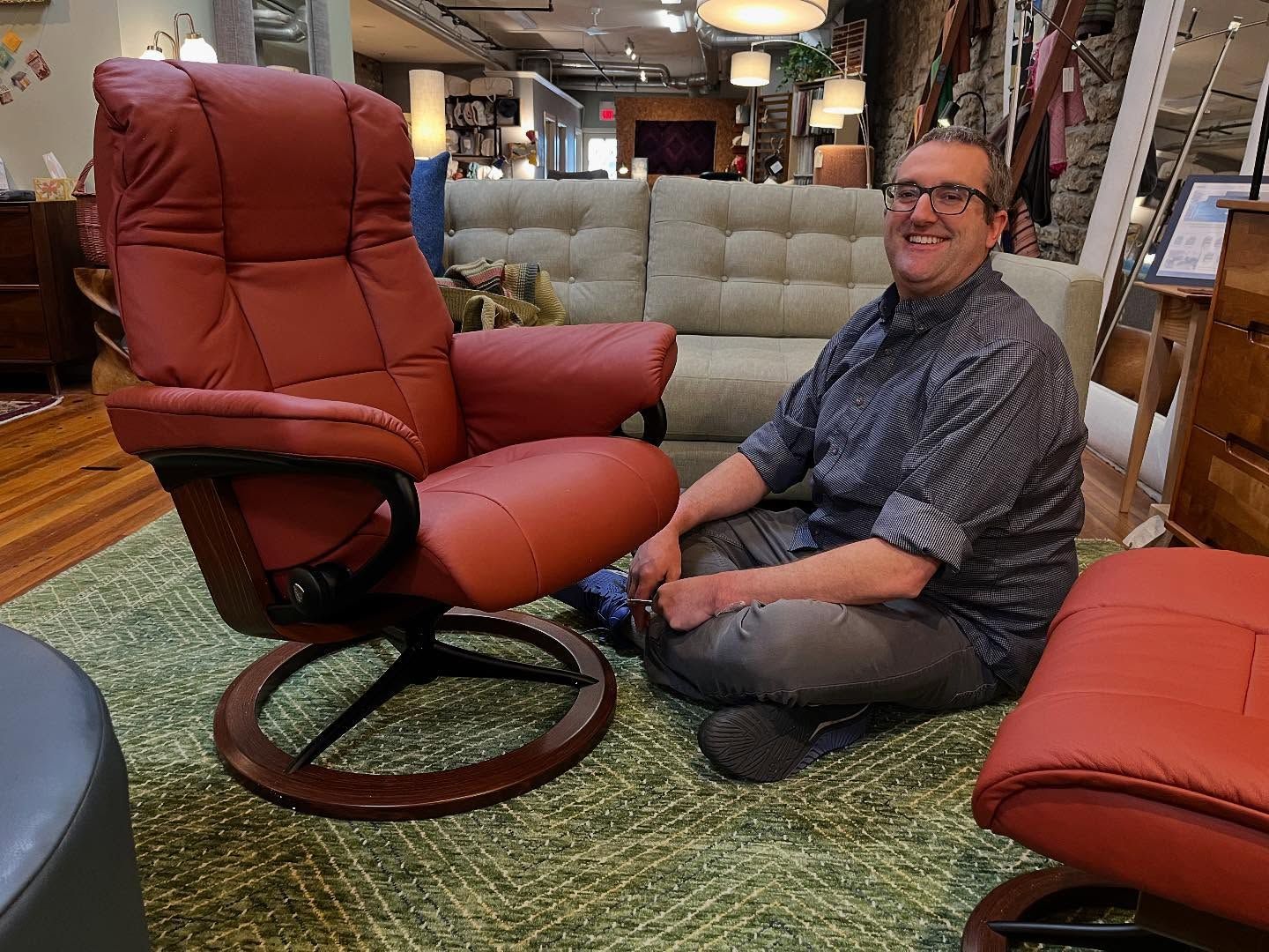 Employee assembling a recliner at Eagles' Rest Natural Mattresses and Furniture inLawrence, Kansas.